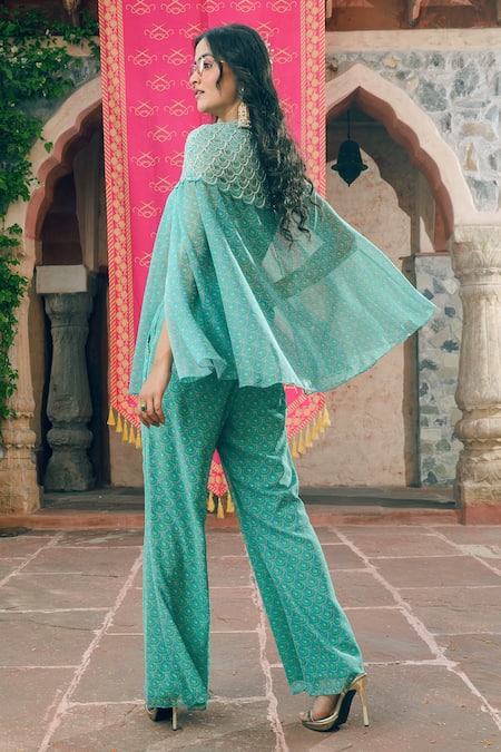 Show Shaa Blue Crepe Sequins Round Neck Splash Print Cape And Pant Set Online at Aza Fashions Show Shaa_Blue Crepe Sequins Round Neck Splash Print Cape And Pant Set _Online_at_Aza_Fashions