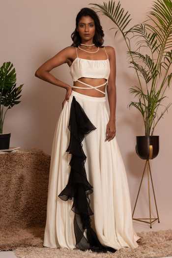 Shop Vanshika Agarwal Label Ivory Organza, Bamboo Pearls, Beads And Black Embroidered Blouse Lehenga Set at Aza Fashions Shop_Vanshika Agarwal Label_Ivory Organza, Bamboo Pearls, Beads And Black Embroidered Blouse Lehenga Set _at_Aza_Fashions