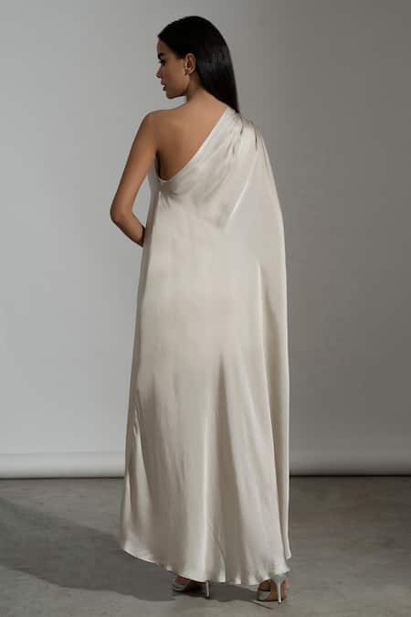 Shop Amrta By Guneet Kondal Off White Viscose Asymmetric Paros One Shoulder Kaftan Gown at Aza Fashions Shop_Amrta By Guneet Kondal_Off White Viscose Asymmetric Paros One Shoulder Kaftan Gown _at_Aza_Fashions