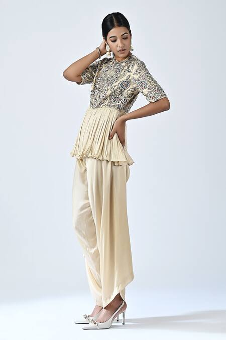 Shop_Sejal Kamdar_Beige Satin Cut Work, Embroidery Round Neck Yoke Peplum Jumpsuit _at_Aza_Fashions