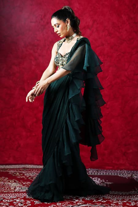 Shop Rashika Sharma Green Chiffon, Organza Zari, Mirrors, Cut Lara Ruffled And Pre-draped Saree Set at Aza Fashions Shop_Rashika Sharma_Green Chiffon, Organza Zari, Mirrors, Cut Lara Ruffled And Pre-draped Saree Set _at_Aza_Fashions