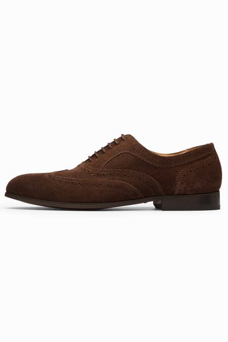 Buy Dapper Shoes Brown Handcrafted Leather Wingtip Oxford Shoes Online at Aza Fashions Buy_Dapper Shoes_Brown Handcrafted Leather Wingtip Oxford Shoes_Online_at_Aza_Fashions