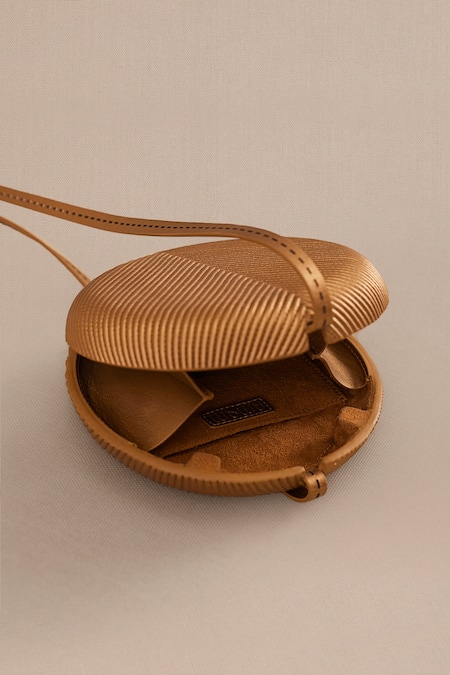 Shop_Ampm_Gold Embroidery Aiza Quilted Circular Shape Sling Bag _Online_at_Aza_Fashions