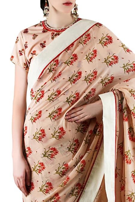Nikasha_Peach Georgette, Poplin Round Printed Saree With Blouse _Online_at_Aza_Fashions