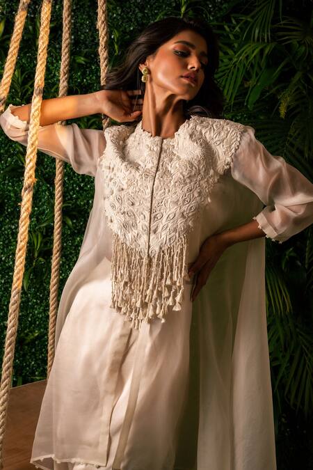 Buy Pallavi Poddar Ivory Organza, Satin, Cotton, Lycra Pearls Round Neck Peacock Cape And Pant Set Online at Aza Fashions Buy_Pallavi Poddar_Ivory Organza, Satin, Cotton, Lycra Pearls Round Neck Peacock Cape And Pant Set _Online_at_Aza_Fashions