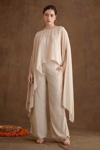 Shop_Nikasha_Cream Viscose Embroidery Neckline Cape And Wide Leg Pant Set _Online_at_Aza_Fashions