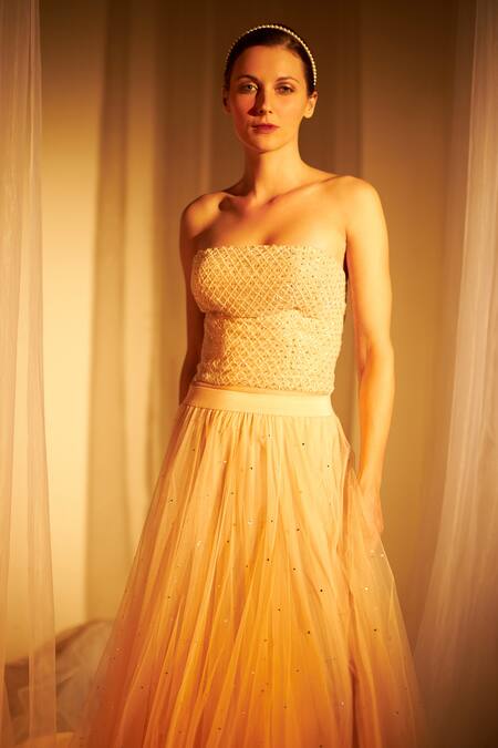 Cherie D Peach Tulle Embroidery Bandeau Corset And Skirt Set Online at Aza Fashions Cherie D_Peach Tulle Embroidery Bandeau Corset And Skirt Set _Online_at_Aza_Fashions