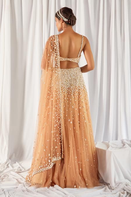 Shop Cherie D Peach Silk, Net, Tulle Sweetheart Neck Embroidered Bridal Lehenga Set at Aza Fashions Shop_Cherie D_Peach Silk, Net, Tulle Sweetheart Neck Embroidered Bridal Lehenga Set _at_Aza_Fashions