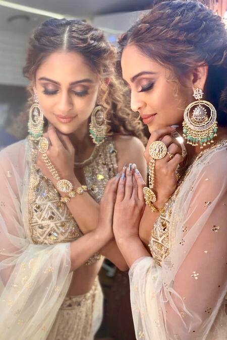 Aaryaa By Kashveen Kohli Off White Georgette, Net Mirrors, Embroidery Round Neck Hand Blouse Lehenga Set at Aza Fashions Aaryaa By Kashveen Kohli_Off White Georgette, Net Mirrors, Embroidery Round Neck Hand Blouse Lehenga Set _at_Aza_Fashions