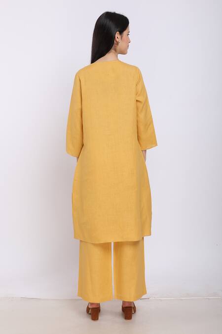 Shop_Linen Bloom_Yellow Pure Linen Embroidered Floral Motifs Round Tunic _at_Aza_Fashions