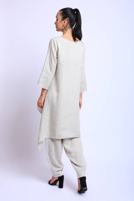 Shop Linen Bloom Beige 100% Linen Floral Motifs Round Asymmetric Tunic at Aza Fashions Shop_Linen Bloom_Beige 100% Linen Floral Motifs Round Asymmetric Tunic _at_Aza_Fashions