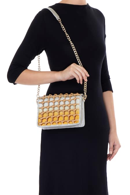 Devina Juneja Metallic Woven Clutch 