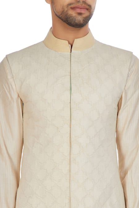 Kunal Anil Tanna Off White Ivory Chanderi Textured High-low Bandhi Jacket at Aza Fashions Kunal Anil Tanna_Off White Ivory Chanderi Textured High-low Bandhi Jacket _at_Aza_Fashions