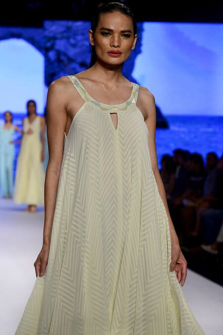 yellow flowy jumpsuit