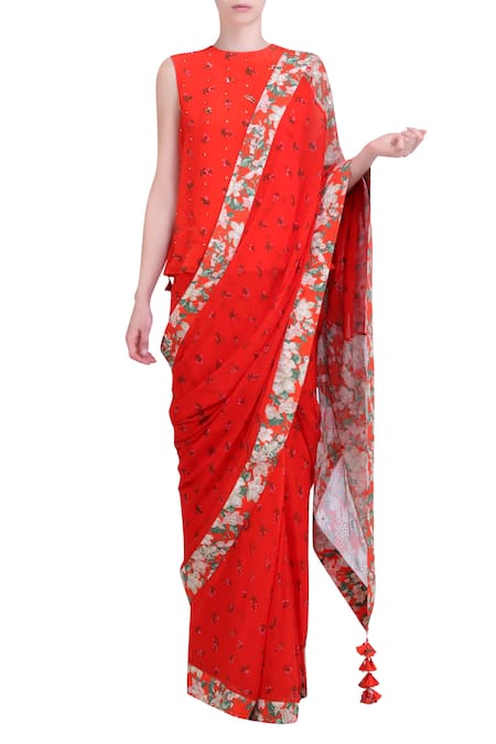 Nikasha Carrot orange chiffon jaal work saree with blouse 