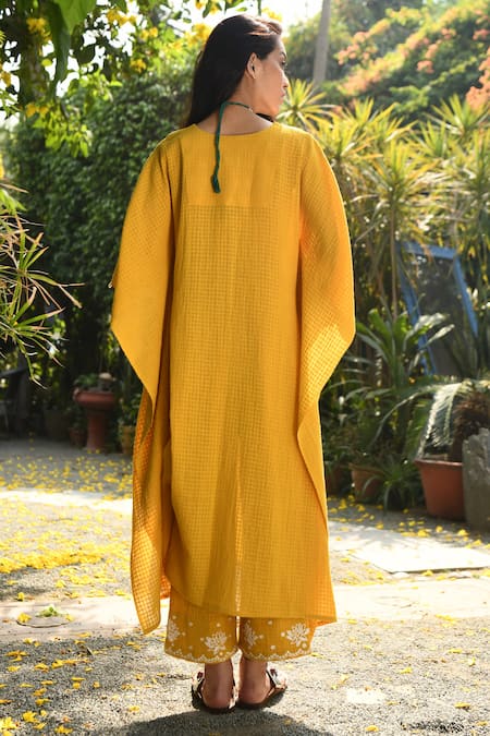 Shop Rekha Agra Yellow Cotton Slub V Neck Embroidered Kurta And Pant Set at Aza Fashions Shop_Rekha Agra_Yellow Cotton Slub V Neck Embroidered Kurta And Pant Set _at_Aza_Fashions