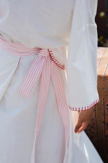 Buy Nikasha White Cotton Embroidered Wrap Skirt Online at Aza Fashions Buy_Nikasha_White Cotton Embroidered Wrap Skirt _Online_at_Aza_Fashions