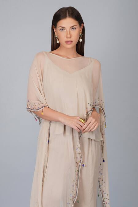 Devyani Mehrotra_Beige Viscose Double Georgette Embroidered Flower Work Border Cape And Pant Set_Online_at_Aza_Fashions