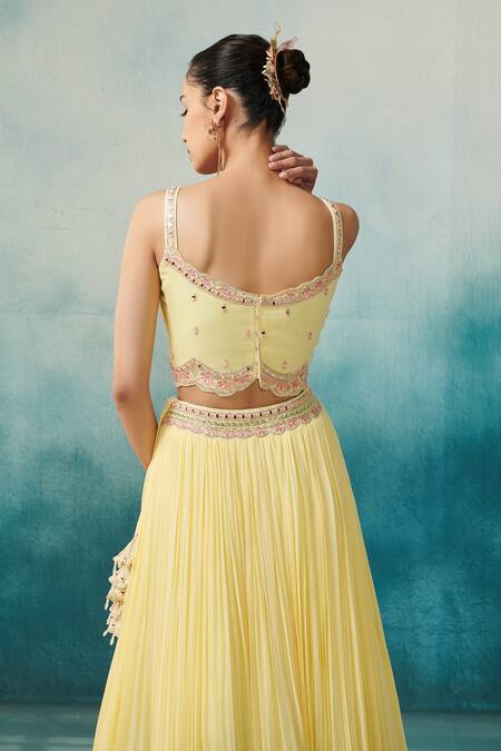 Buy_SUHINO_Yellow Georgette, Cotton Embroidery, Tassels Round Neck Cape And Pleated Skirt Set_Online_at_Aza_Fashions