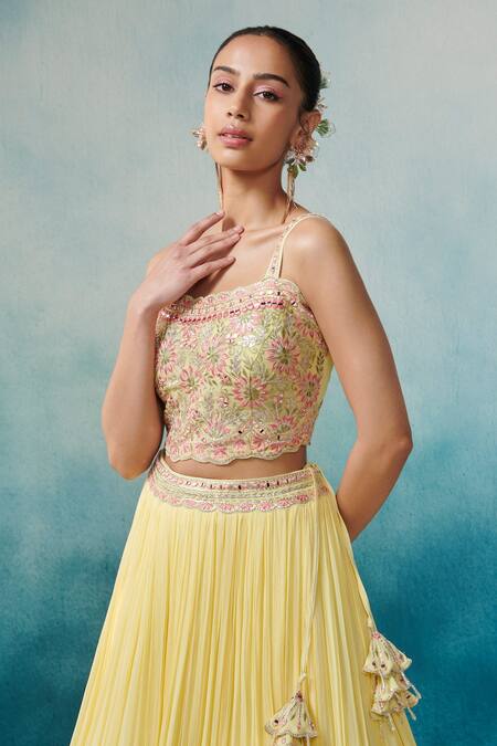Shop_SUHINO_Yellow Georgette, Cotton Embroidery, Tassels Round Neck Cape And Pleated Skirt Set_Online_at_Aza_Fashions