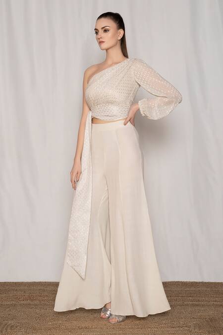 Buy Amrta By Guneet Kondal Off White Viscose Metallic Thread Embroidered Draped Top And Flared Pant Set Online at Aza Fashions Buy_Amrta By Guneet Kondal_Off White Viscose Metallic Thread Embroidered Draped Top And Flared Pant Set_Online_at_Aza_Fashions