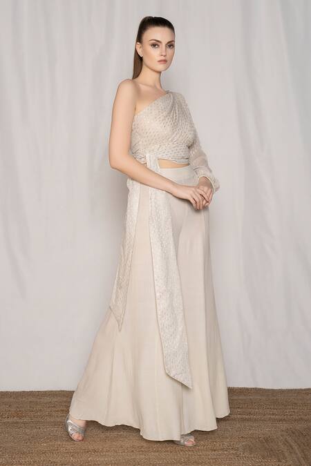 Shop Amrta By Guneet Kondal Off White Viscose Metallic Thread Embroidered Draped Top And Flared Pant Set Online at Aza Fashions Shop_Amrta By Guneet Kondal_Off White Viscose Metallic Thread Embroidered Draped Top And Flared Pant Set_Online_at_Aza_Fashions