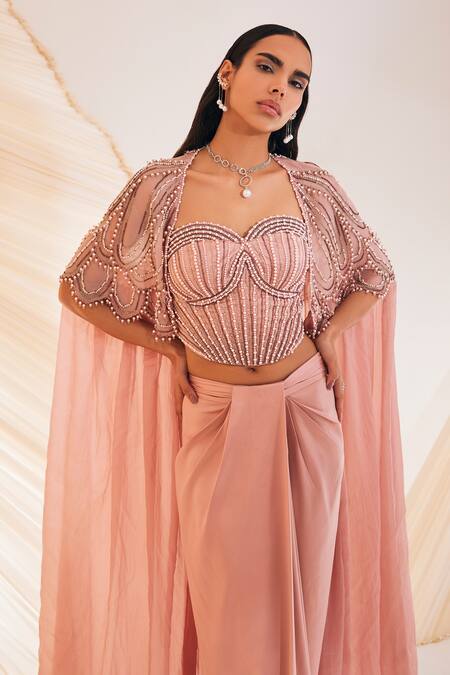 Divya Aggarwal Pink Satin Pearls Sweetheart Hand Embroidered Scallop Pattern Cape Skirt Set Online at Aza Fashions Divya Aggarwal_Pink Satin Pearls Sweetheart Hand Embroidered Scallop Pattern Cape Skirt Set _Online_at_Aza_Fashions