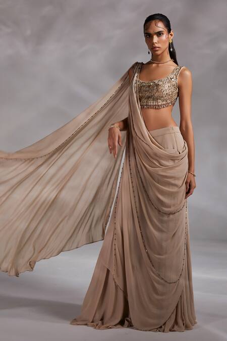 Shop Divya Aggarwal Beige Silk Chiffon Tassel Deep Taylen Pre-draped Saree With Embellished Blouse Online at Aza Fashions Shop_Divya Aggarwal_Beige Silk Chiffon Tassel Deep Taylen Pre-draped Saree With Embellished Blouse _Online_at_Aza_Fashions