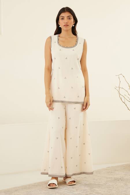 Cotton And Clay White Silk, Modal Embroidery, Beluga Hand Block Print Kurta Flared Trouser Set Online at Aza Fashions Cotton And Clay_White Silk, Modal Embroidery, Beluga Hand Block Print Kurta Flared Trouser Set _Online_at_Aza_Fashions