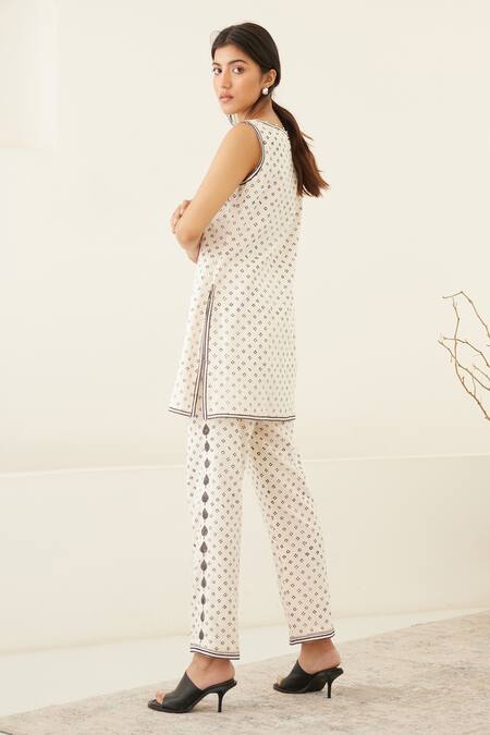 Buy Cotton And Clay White Silk, Modal Pearls, Embroidery Beluga Hand Block Print Jacket Trouser Set Online at Aza Fashions Buy_Cotton And Clay_White Silk, Modal Pearls, Embroidery Beluga Hand Block Print Jacket Trouser Set _Online_at_Aza_Fashions