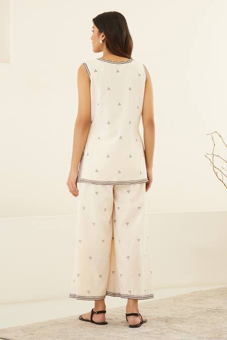 Buy Cotton And Clay White Silk, Modal Embroidery, Beluga Hand Block Print Kurta Flared Trouser Set Online at Aza Fashions Buy_Cotton And Clay_White Silk, Modal Embroidery, Beluga Hand Block Print Kurta Flared Trouser Set _Online_at_Aza_Fashions