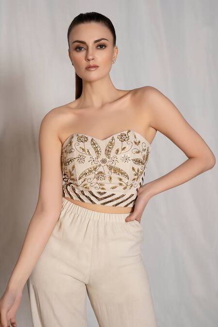 Shop Amrta By Guneet Kondal Gold Viscose Beads, Sequins, Embroidery Sweetheart Neck Bustier And Jogger Set Online at Aza Fashions Shop_Amrta By Guneet Kondal_Gold Viscose Beads, Sequins, Embroidery Sweetheart Neck Bustier And Jogger Set _Online_at_Aza_Fashions