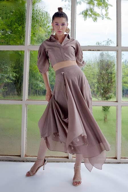 Garima Bindal Brown Silk Tassels Shawl Neck Cascade Drape Sleeve Crop Top And Skirt Set at Aza Fashions Garima Bindal_Brown Silk Tassels Shawl Neck Cascade Drape Sleeve Crop Top And Skirt Set _at_Aza_Fashions