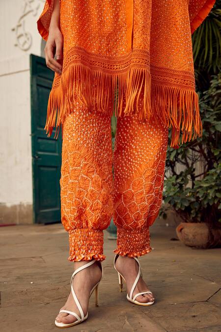 Shop Twenty Nine Orange Crepe Fringe V-neck Crushed Bandhani Hoodie Online at Aza Fashions Shop_Twenty Nine_Orange Crepe Fringe V-neck Crushed Bandhani Hoodie _Online_at_Aza_Fashions