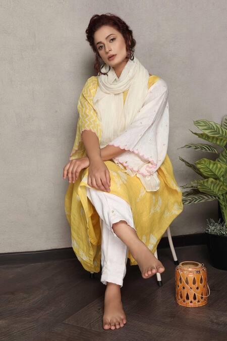 Falguni.Foram_Yellow Linen Tassels Boat Neck Floral Print Gathered Kaftan Dress_at_Aza_Fashions