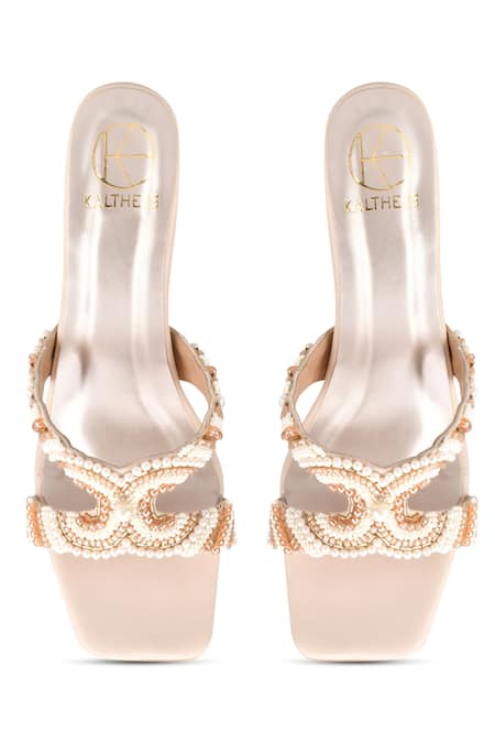 Kaltheos Cream Embellished Pearls And Bead Hourglass Heels Online at Aza Fashions Kaltheos_Cream Embellished Pearls And Bead Hourglass Heels_Online_at_Aza_Fashions