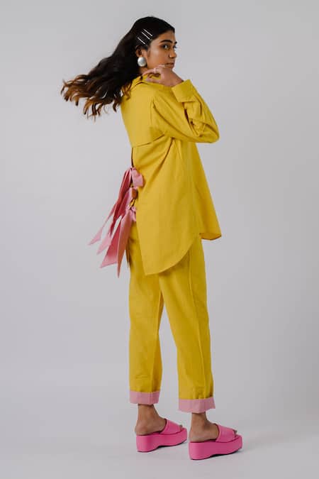 Tussah By Siddhi Shah Yellow Cotton Bows Collared Solid Asymmetric Shirt And Pant Set Online at Aza Fashions Tussah By Siddhi Shah_Yellow Cotton Bows Collared Solid Asymmetric Shirt And Pant Set _Online_at_Aza_Fashions