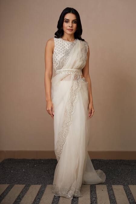 ASTHA NARANG_White Organza, Crepe Sequins, Cut Work, Zari, Scallop Border Saree With Blouse _Online_at_Aza_Fashions