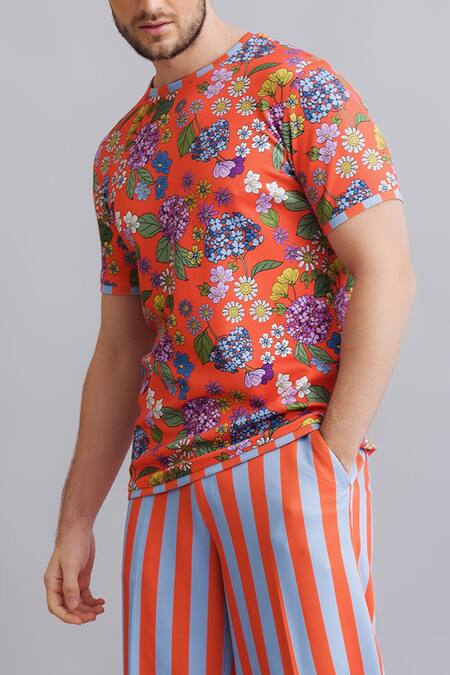 Nautanky_Orange Neoprene Floral, Striped Print T-shirt And Pant Set _at_Aza_Fashions