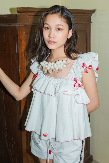 Nikasha White Cotton Square Neck Embroidered Ruffle Top Online at Aza Fashions Nikasha_White Cotton Square Neck Embroidered Ruffle Top _Online_at_Aza_Fashions