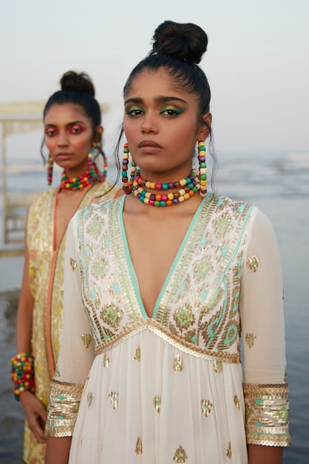 Gopi Vaid_White Georgette And Chiffon Ikat & Sequin V Neck Zohra Peplum Kurta Sharara Set_at_Aza_Fashions