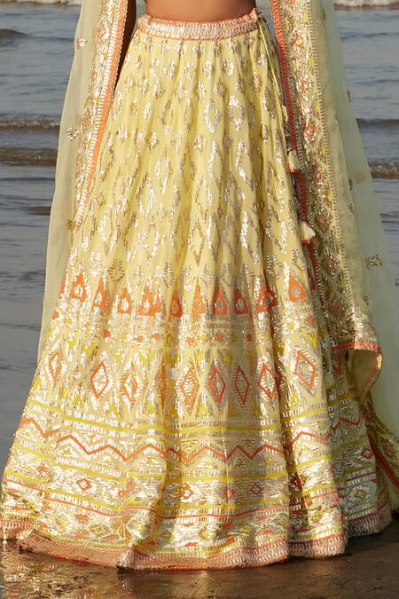 Gopi Vaid_Yellow Georgette And Organza Ikat & Sequin V Alia Embroidered Cape Lehenga Set _at_Aza_Fashions