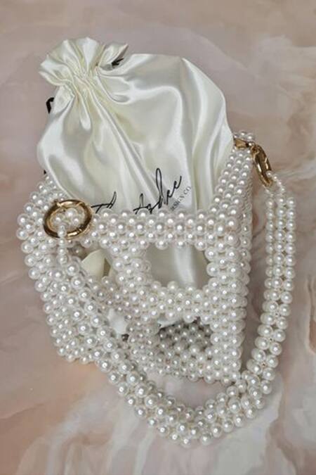 The Ashlee Design CO._Off White Applique Acrylic Pearl Embellished Bag_Online_at_Aza_Fashions