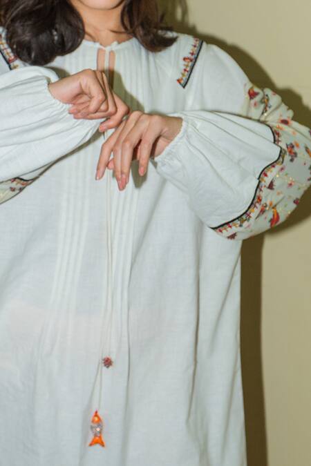 Buy Nikasha White Cotton Round Embroidered Dress Online at Aza Fashions Buy_Nikasha_White Cotton Round Embroidered Dress _Online_at_Aza_Fashions