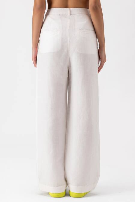 Buy_Genes Lecoanet Hemant_White Plain Flared Trouser _Online_at_Aza_Fashions