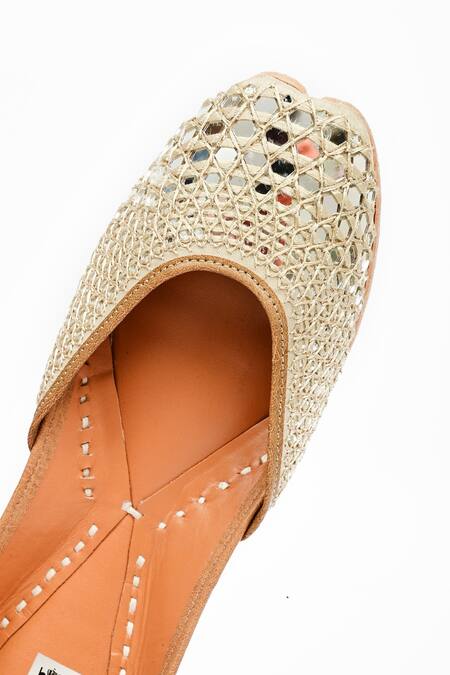 Buy Miar Designs Ivory Resham Thread And Mirror Embroidered Tej Juttis Online at Aza Fashions Buy_Miar Designs_Ivory Resham Thread And Mirror Embroidered Tej Juttis_Online_at_Aza_Fashions