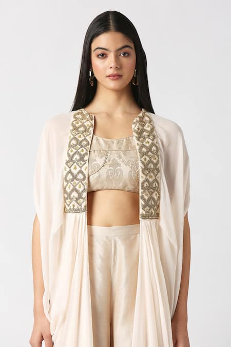 Buy Labbada Ivory Cape Viscose Georgette Hand Embroidered Marodi And Brocade Palazzo Set Online at Aza Fashions Buy_Labbada_Ivory Cape Viscose Georgette Hand Embroidered Marodi And Brocade Palazzo Set_Online_at_Aza_Fashions