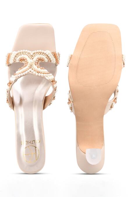 Buy Kaltheos Cream Embellished Pearls And Bead Hourglass Heels Online at Aza Fashions Buy_Kaltheos_Cream Embellished Pearls And Bead Hourglass Heels_Online_at_Aza_Fashions