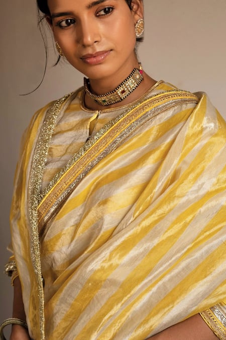 Buy Shorshe Clothing Yellow Handloom Cotton Zari Tissue Stripe Pattern Saree Online at Aza Fashions Buy_Shorshe Clothing_Yellow Handloom Cotton Zari Tissue Stripe Pattern Saree _Online_at_Aza_Fashions