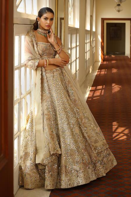 Miku Kumar_Ivory Silk, Net Sequins, Cut Work, Scattered Embellished Bridal Lehenga Set _at_Aza_Fashions